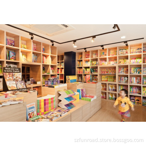 wood mounted shelf and display tables for book shop interior design